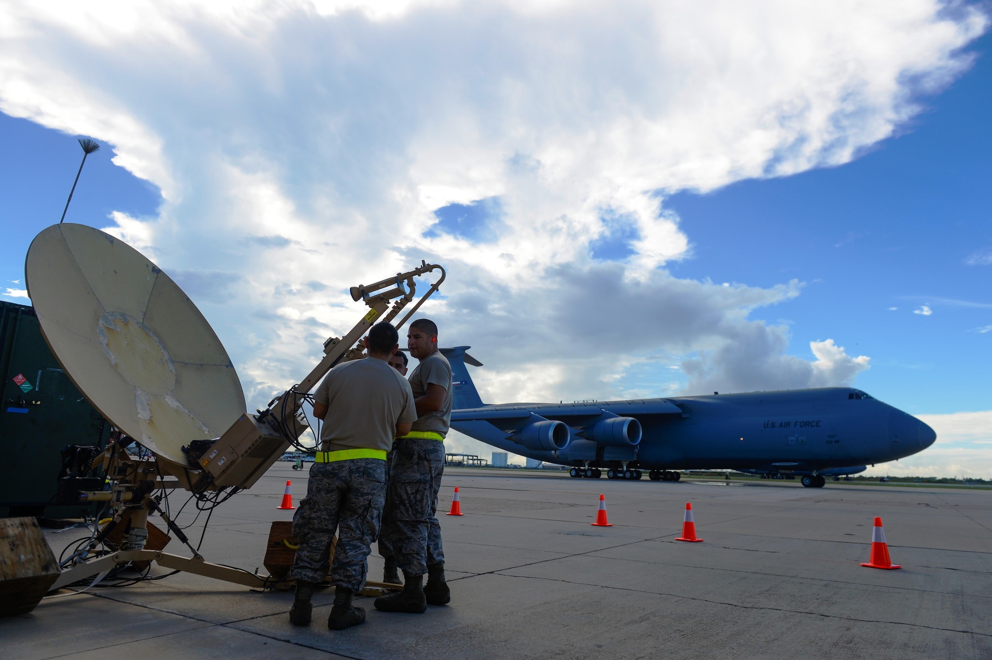 Airmen from the 433rd Airlift Control Flight, Joint Base San Antonio-Lackland, Texas, assemble a small package of initial communications equipment during Exercise Alamo Express at Corpus Christi Naval Air Station, Texas, Sept. 16, 2016. Alamo Express is the 433rd AW’s premier training exercise that prepares Airmen for real-world situations. During the exercise, aircrew conduct land and water survival training, cargo uploading and downloading, communications, aerial port procedures, transportation and oversight of the total air mobility process. (U.S. Air Force photo/Staff Sgt. Matthew B. Fredericks)