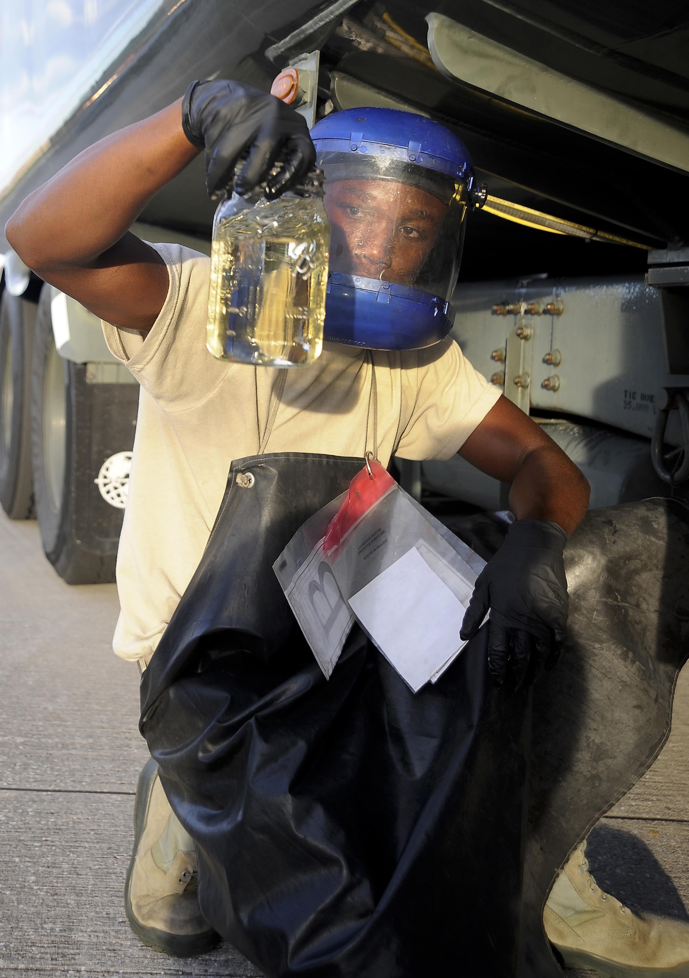 Airman Raymond Randall, a distribution truck operator with the 6th Logistics Readiness Squadron, performs a fuel test at MacDill Air Force Base, Fla., Sept. 21, 2016. Fuel testing is performed daily to ensure fuel quality is at its best. (U.S. Air Force photo by Airman 1st Class Mariette Adams)