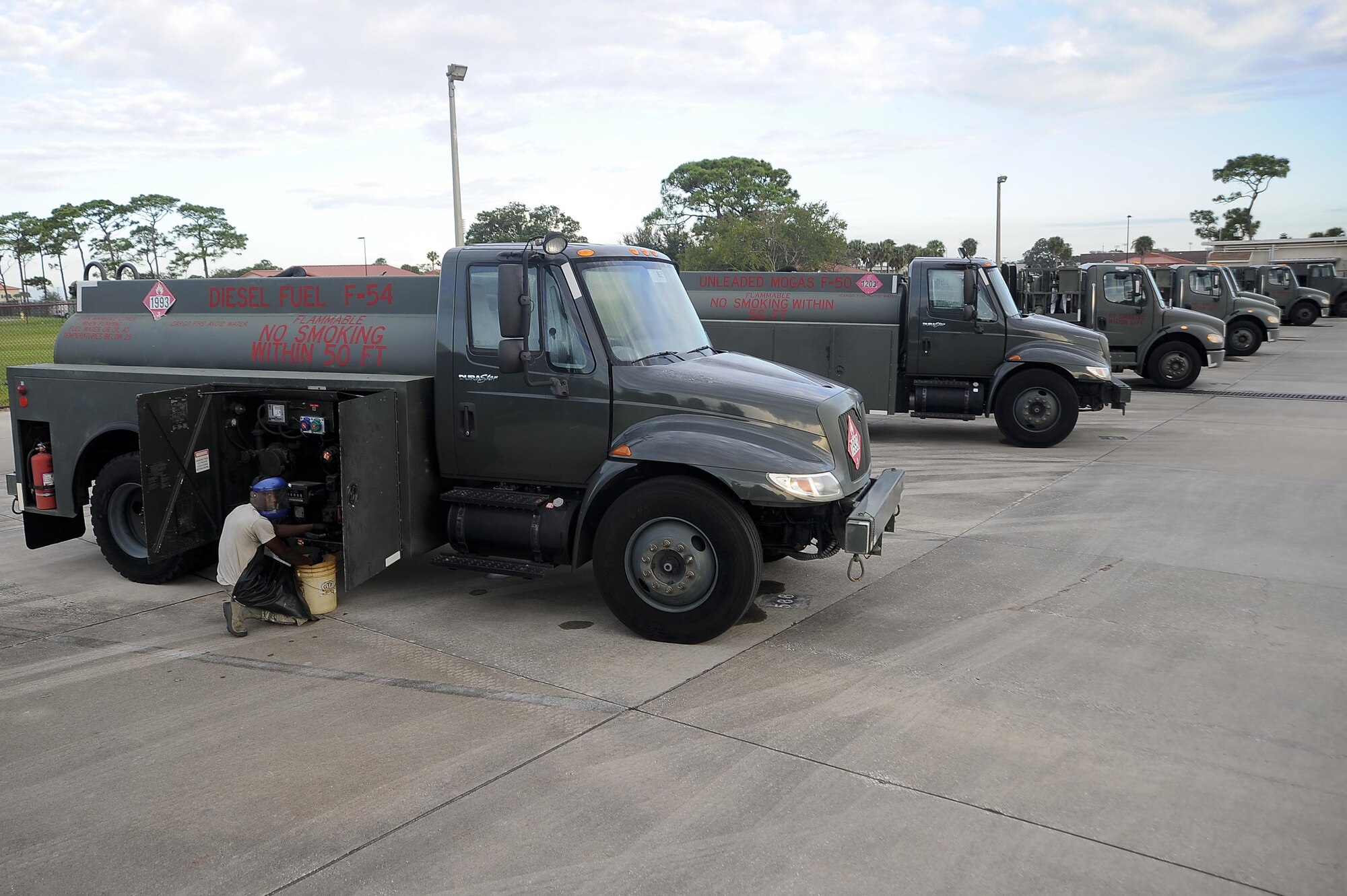 Airman Raymond Randall, a distribution truck operator with the 6th Logistics Readiness Squadron, performs a fuel test at MacDill Air Force Base, Fla., Sept. 21, 2016. Petroleum, oil, lubricants Airmen are responsible for providing fuel throughout MacDill. (U.S. Air Force photo by Airman 1st Class Mariette Adams)