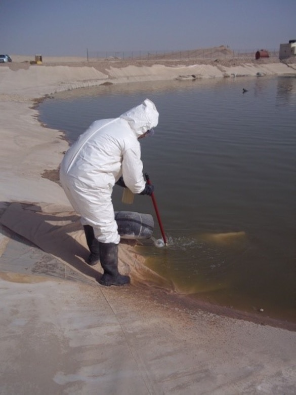 A U.S. Army Central environmental waste employee checks the condition of a wastewater lagoon operation and management facility at Camp Beuhring, Kuwait. A lack of environmental protection, long-running conflicts, natural conditions and industrialization issues prove to be daunting challenges that the military is constantly working to overcome. ARCENT’s goal is to appropriately manage available resources while maximizing operational capability, resource availability and well-being. This includes initiating actions to limit damage to the environment caused during full spectrum operations wherever and whenever possible.