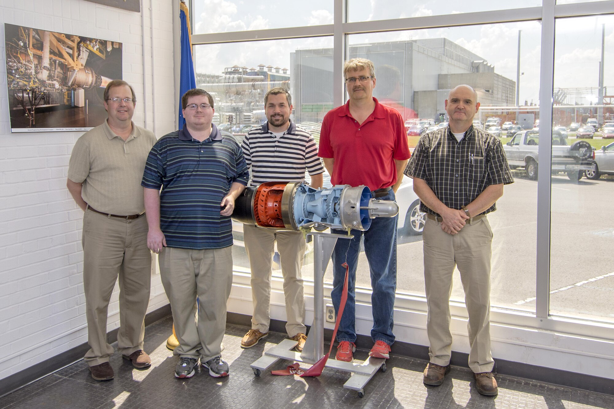 A group of AEDC software engineers, pictured here, recently assisted in improving the Computer Assisted Dynamic Data Monitoring and Analysis System and Propulsion Data Processing and Analysis System to benefit operations of future turbine test projects. Some of the engineers involved in this effort were, left to right, Stephen Powell, Michael Walker, Nathan Harrison, Rusty Zarecor and Phil Voyles. 