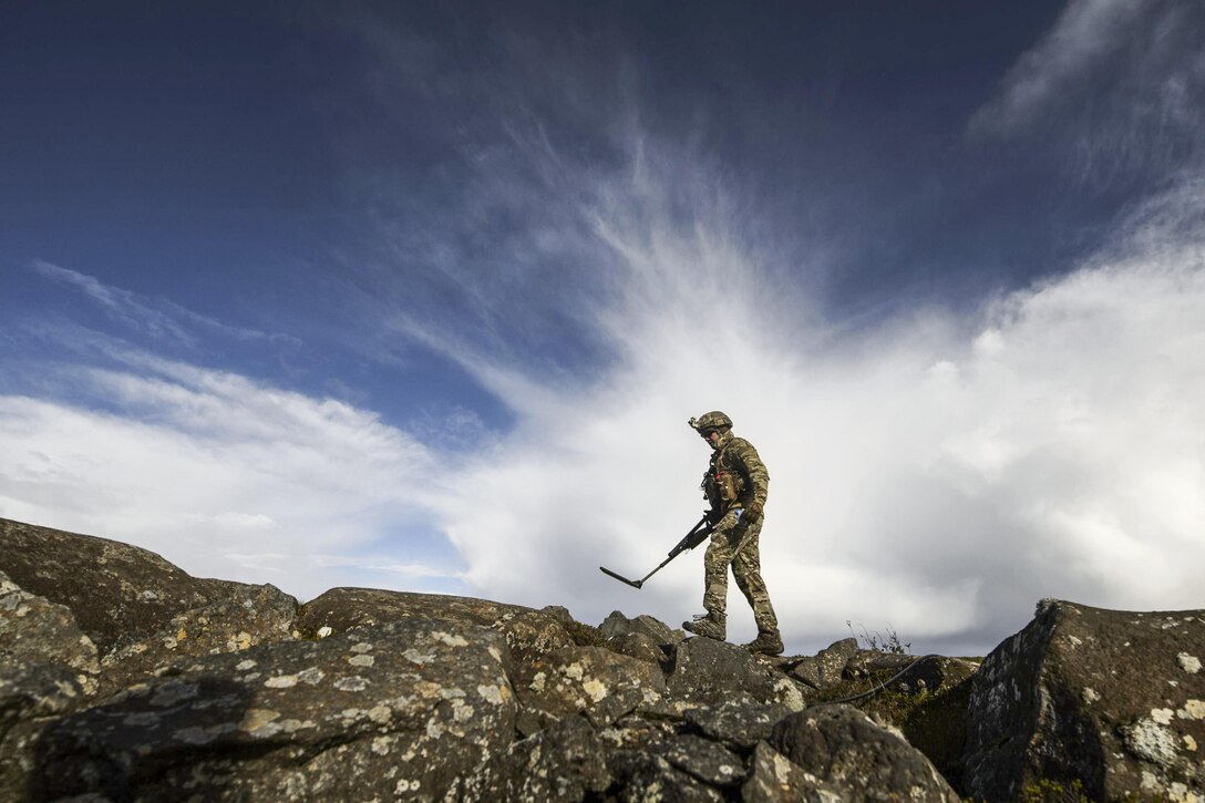 Air Force Staff Sgt. Cole Carroll sweeps an area with a mine detector during Northern Challenge 16 at Icelandic Coast Guard Keflavik Facility, Iceland, Sept. 19, 2016. The exercise focused on disabling improvised explosive devices to support counterterrorism tactics to prepare NATO and Nordic nations for international deployments. Carroll is assigned to the 52nd Civil Engineer Squadron. Air Force photo by Staff Sgt. Jonathan Snyder