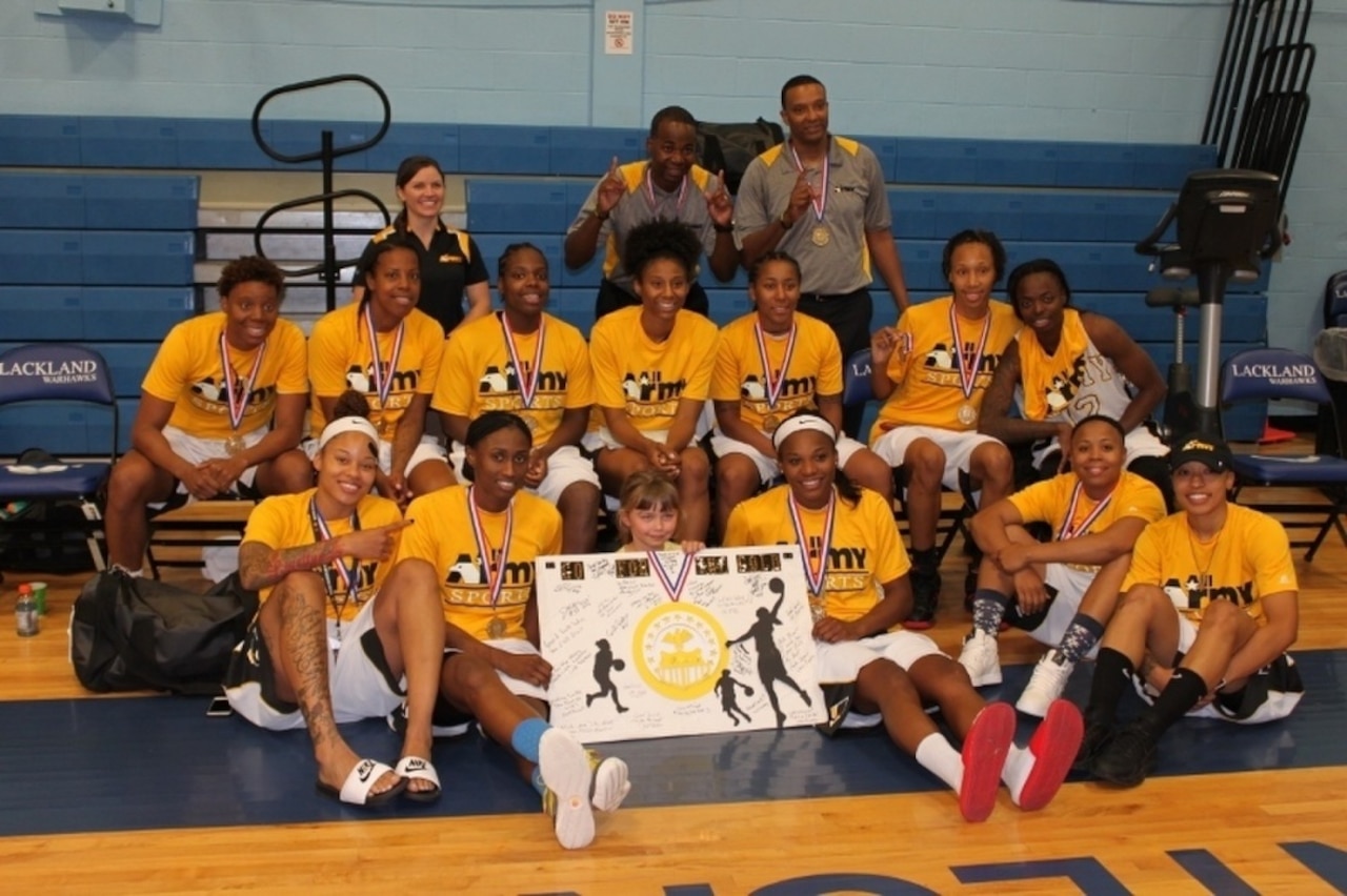 The All-Army Women’s Basketball Team poses for a photo after winning the Armed Forces Championship game against the Navy in San Antonio, Texas. Members of the team went on to compete in the World Military Basketball Championship as Team USA. Courtesy photo