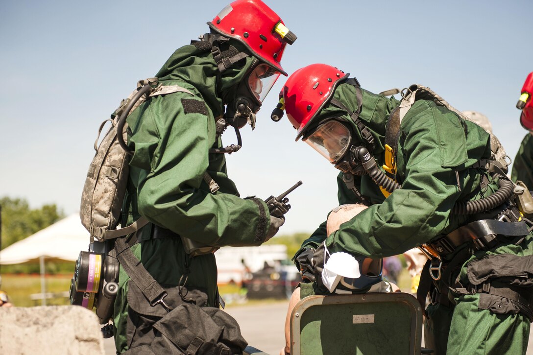 Soldiers and airmen provide aid to a simulated disaster victim during the Homeland Response Force training and evaluation exercise at the State Preparedness Training Center in Oriskany, N.Y., June 16, 2016. Air National Guard photo by Tech. Sgt. Jeremy M. Call