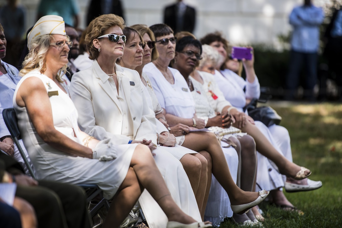 Gold Star Mothers listen as Army Chief of Staff Gen. Mark A. Milley (not pictured) offers remarks during the 80th Gold Star Mother's Day commemorative ceremony at Arlington National Cemetery in Arlington, Va., Sept. 25, 2016. Army photo by Rachel Larue