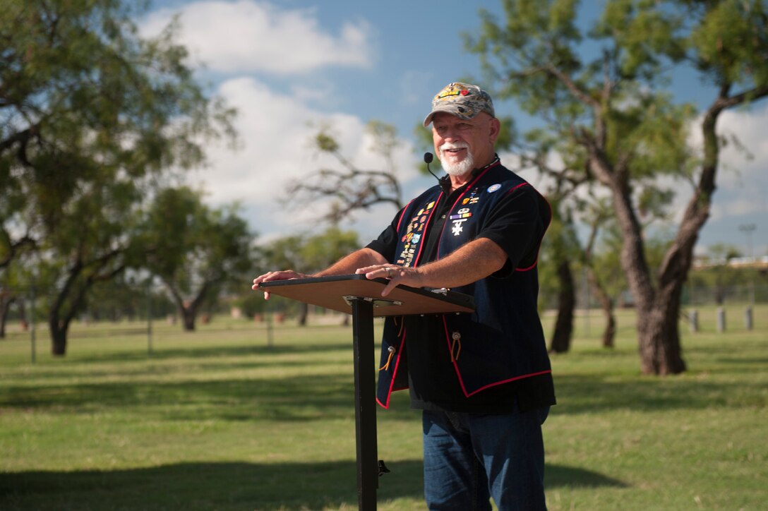 U.S. Marine Corps Vietnam veteran Jack Hinkle addresses the crowd during a ceremony to honor Vietnam War veterans at the Dyess Memorial Center, Abilene, Texas, Sept. 23, 2016. More than 70 participating Vietnam veterans were presented lapel pins provided by the United States of America Vietnam War Commemoration for their service during the Vietnam War era. (U.S. Air Force Photo by Airman 1st Class Rebecca Van Syoc)