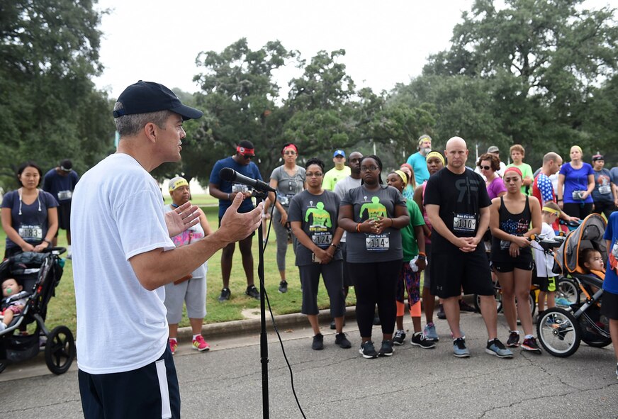 Brig. Gen. John DeGoes, 59th Medical Wing vice commander, gives opening remarks at the 4th Annual 5K Run for Life event at Heritage Park on Joint Base San Antonio-Randolph, Texas, Sept. 24, 2016. Hosted by the 59th Medical Wing, the event coincides with National Suicide Prevention month. (U.S. Air Force photo/Staff Sgt. Jerilyn Quintanilla)
