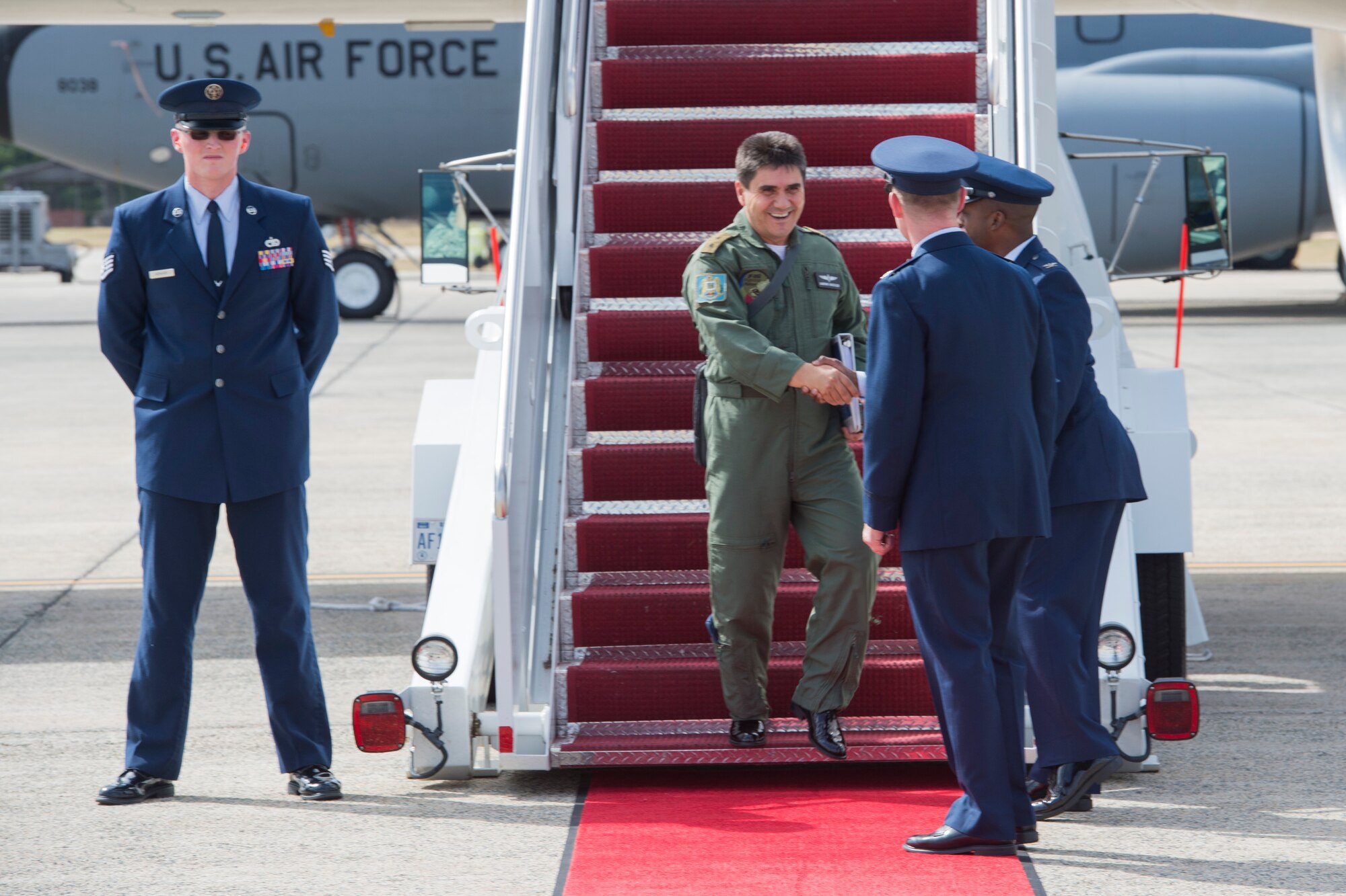Maj. Gen. Laurian Anastasof, Romanian Air Force Chief of Staff, is greeted by U.S. Air Force leadership upon arrival at Joint Base Andrews, Md., Sept. 18, 2016. They arrived in the U.S. for the semi-annual NATO Air Chiefs Symposium to discuss air and space power. (Photo by Senior Airman Ryan J. Sonnier)