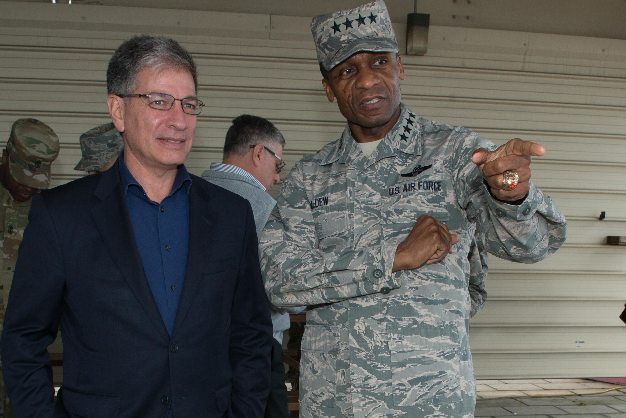 Air Force General Darren McDew, U.S. Transportation Command; commander, talks with Anchorage Mayor Ethan Berkowitz during a visit to Joint Base Elmendorf-Richardson to get a boots-on-the-ground perspective of Alaska's joint mission and meet with the Airmen and Soldiers who accomplish it, Sept. 22, 2016. USTRANSCOM is the single manager for global air, land and sea transportation for the Department of Defense.