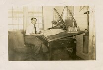 Mr. Paul Jaffe sits at his desk at Ent Air Force Base in Colorado Springs, Colo. in the 1950's.  Jaffe is the designer of the original North American Aerospace Defense Command emblem.  NORAD was formally established in 1958.  Jaffe’s daughter, Ms. Mona Rowe, donated her late father’s original artwork of the emblem to the command at the NORAD and U.S. Northern Command Headquarters in Colorado Springs, Colo., Sept. 23, 2016.  (Jaffe Family Courtesy Photo)