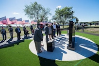 Marine Corps Gen. Joe Dunford, center, chairman of the Joint Chiefs of Staff, helps unveil the new Gold Star Families Memorial Monument in Fall River, Mass., Sept. 25, 2016. The memorial is a tribute to the Massachusetts families who lost loved ones in military service to the country. DoD Photo by Navy Petty Officer 2nd Class Dominique A. Pineiro