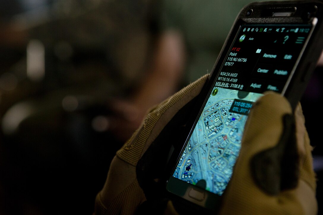 A U.S. Marine Corps student with infantry officers course utilizes a tablet for tactical communications during exercise Talon Reach near Yuma, Ariz., Sept. 23, 2016. This evolution provided IOC students exposure to Marine Air Ground Task Force mission planning and execution through the conduct of a long-range, non-combatant, evacuation exercise that extended to both the Combat Center at 29 Palms, Calf. and Marine Corps Air Station Yuma, Ariz. IOC students coordinated with Marine Aviation Weapons and Tactics Squadron One instructors to conduct the command operations center activities, test communications and utilize innovative technologies. 