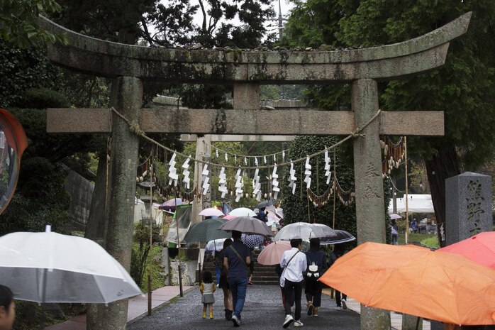 Japanese locals make their way toward the Kumano Brush festival in Kumano, Japan, Sept. 22, 2016. Marine Corps Air Station Iwakuni residents traveled to Kumano with the Cultural Adaptation Program to experience calligraphy, tradition, history and entertainment the festival offered. After attending the festival the residents visited the Fudenosato Kobo Museum where they learned how calligraphy equipment is made. (U.S. Marine Corps photo by Lance Cpl. Joseph Abrego)