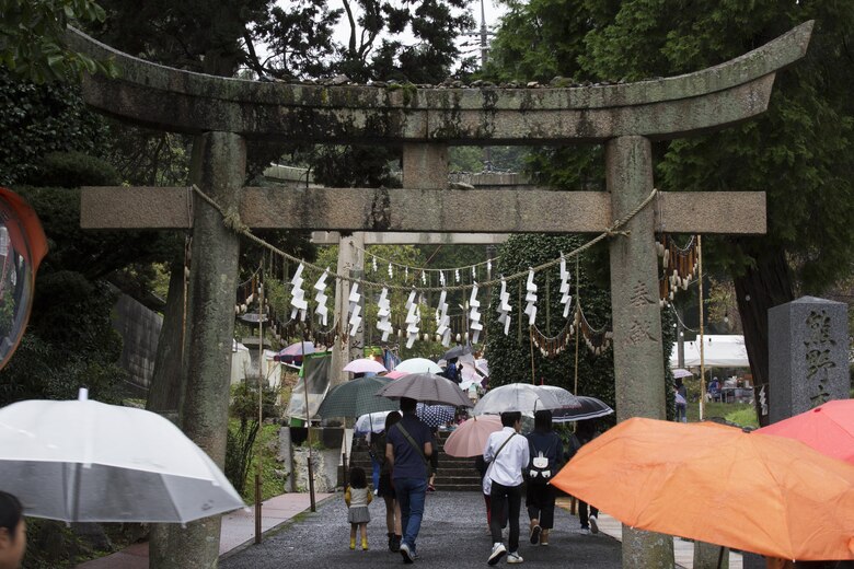 Japanese locals make their way toward the Kumano Brush festival in Kumano, Japan, Sept. 22, 2016. Marine Corps Air Station Iwakuni residents traveled to Kumano with the Cultural Adaptation Program to experience calligraphy, tradition, history and entertainment the festival offered. After attending the festival the residents visited the Fudenosato Kobo Museum where they learned how calligraphy equipment is made. (U.S. Marine Corps photo by Lance Cpl. Joseph Abrego)