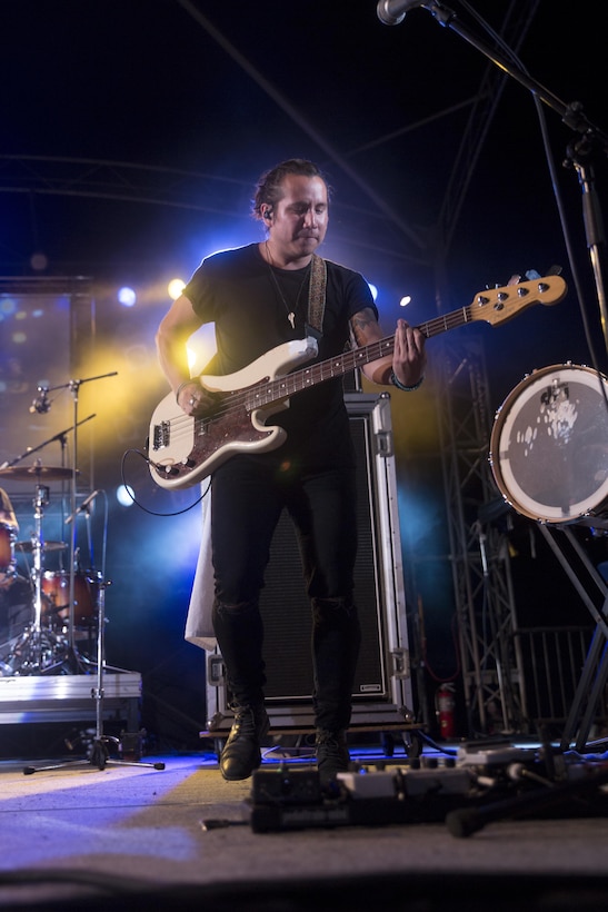 Dave Rublin plays the bass guitar during the headlining concert of the 22nd Annual Camp Hansen Festival Sept. 3 aboard Camp Hansen, Okinawa, Japan. The annual festival is hosted by Camp Hansen to bring Status of Forces Agreement personnel and Okinawa residents together through food, games, rides and music. More than 12,855 attendees came together during the two-day event to enjoy the festivities and rock out to a free concert by the headlining band, American Authors. Rublin is a bass guitarist with American Authors and is a Bogota, Colombia, native.