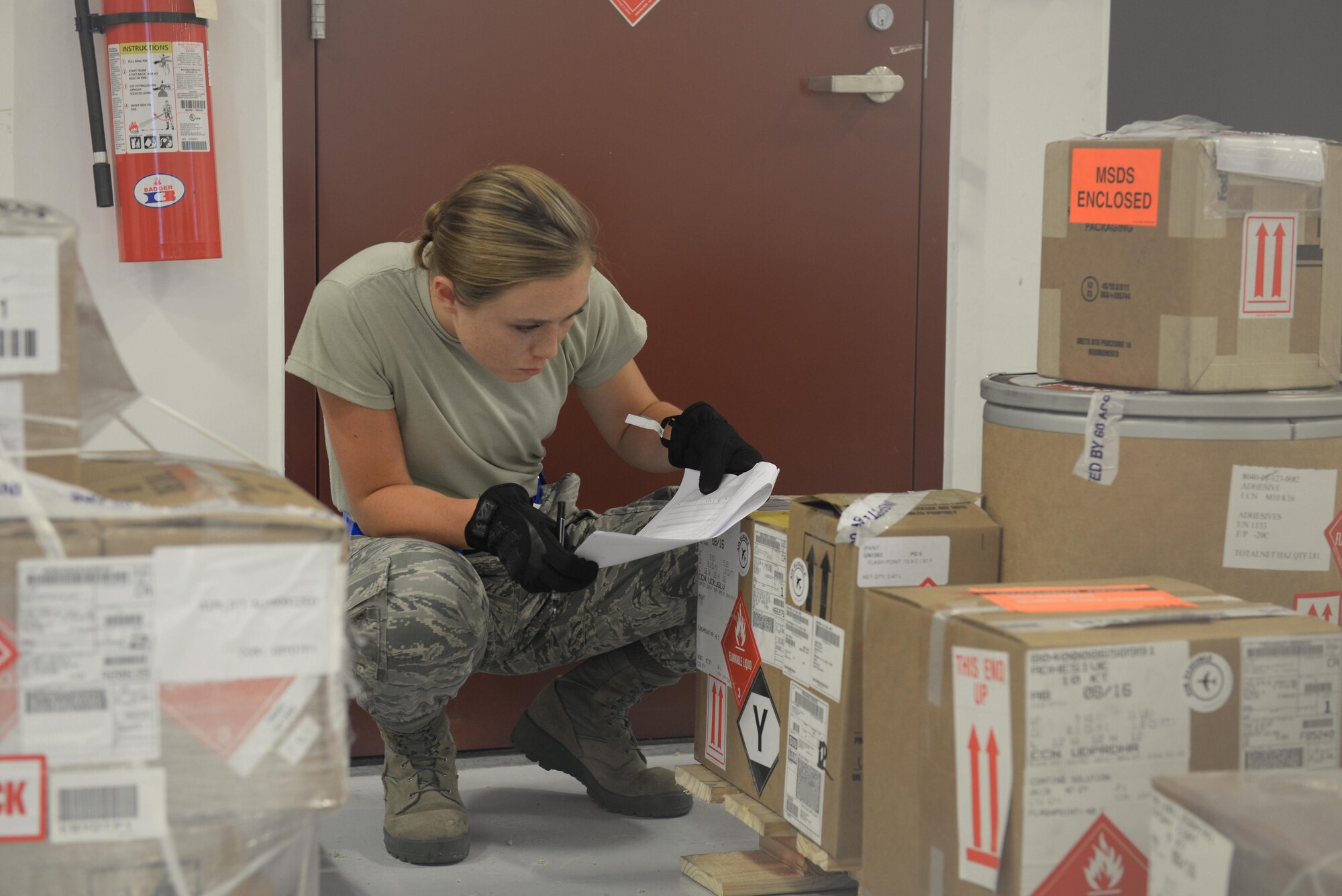 Airman 1st Class Adria Brown, 734th Air Mobility Squadron aircraft services technician, verifies incoming cargo Sept. 7, 2016, at Andersen Air Force Base, Guam. The 734th AMS, a tenant unit from Air Mobility Command, supports the 36th Wing’s mission of projecting airpower by transporting essential material to and from Andersen AFB or for humanitarian response. (U.S. Air Force photo by Airman 1st Class Jacob Skovo)
