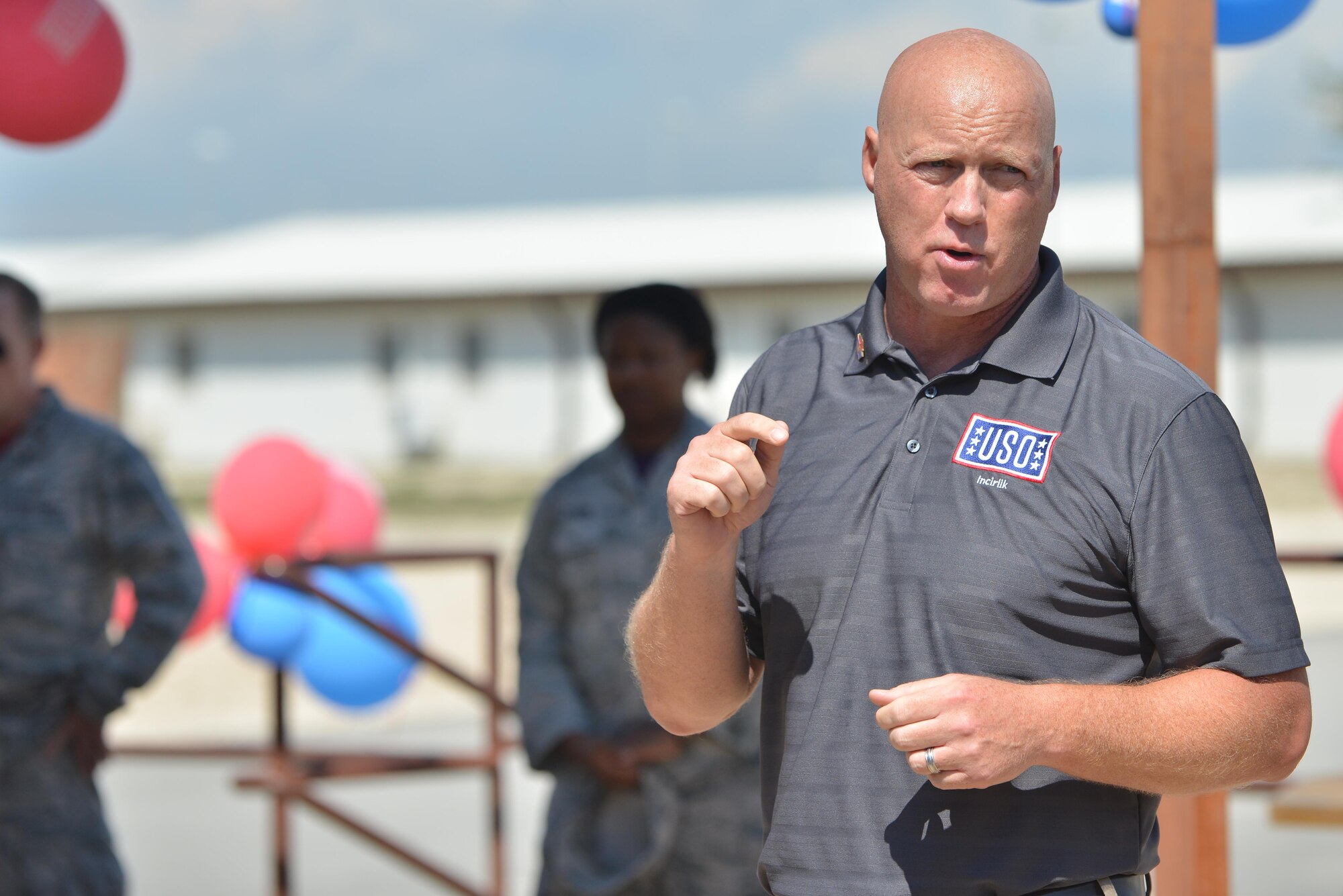 Grant McCormick, Rhein Main Area director, speaks to personnel attending the USO Incirlik grand opening ceremony Sept. 23, 2016, at Incirlik Air Base, Turkey. USO Incirlik provides U.S. and coalition forces a place to come together and relax during their off time. (U.S. Air Force photo by Senior Airman John Nieves Camacho)