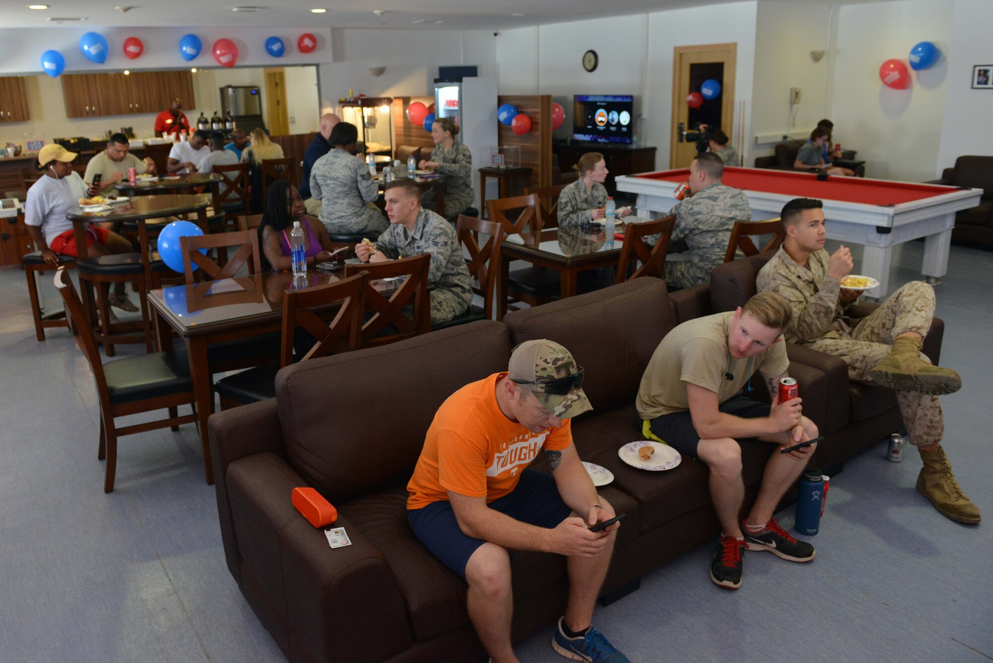 Servicemembers unwind in USO Incirlik after its grand opening ceremony Sept. 23, 2016, at Incirlik Air Base, Turkey. USO Incirlik is open Sunday through Thursday from 10 a.m. to 11 p.m., and Friday and Saturday from 10 to 1 a.m. (U.S. Air Force photo by Senior Airman John Nieves Camacho)