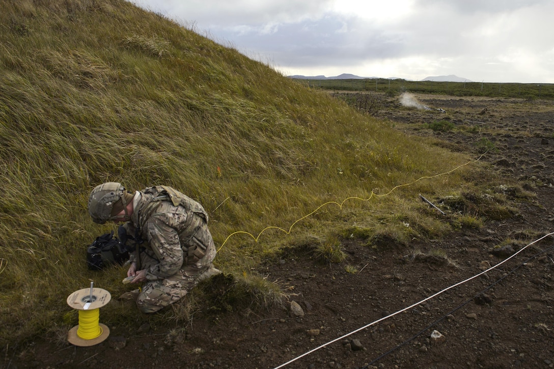 Air Force Senior Airman Kyle Koski detonates improvised explosive devices during Northern Challenge 16 at Icelandic Coast Guard Keflavik Facility, Iceland, Sept. 19, 2016. Koski is an explosive ordnance disposal craftsman assigned to the 52nd Civil Engineer Squadron. Air Force photo by Staff Sgt. Jonathan Snyder 