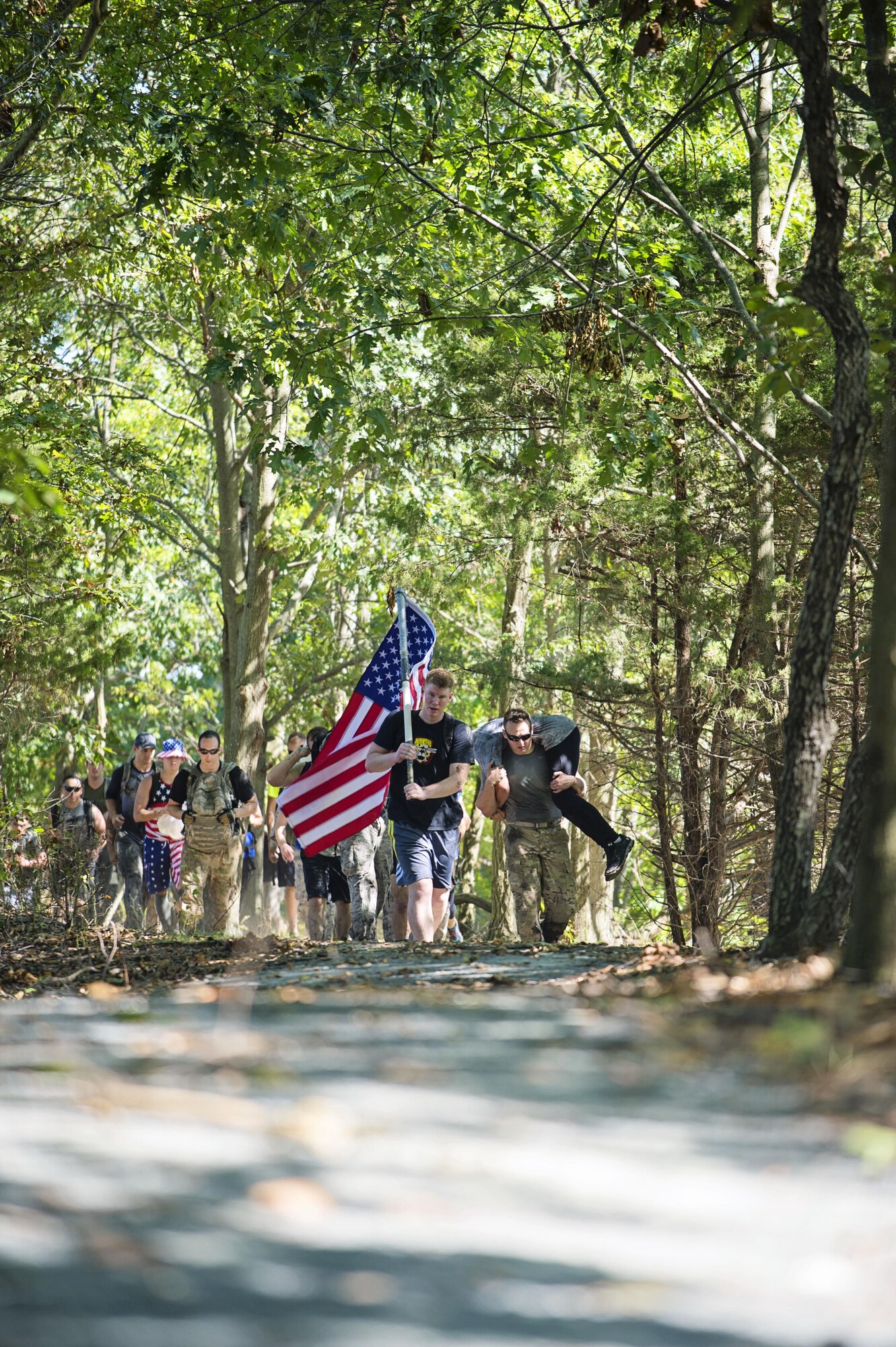 Nearly 30 Team Dover members participated in the GORUCK challenge near Dover Air Force Base, Del, on Sept. 23, 2016. Based on Special Forces training, the class was led from start to finish by a Special Forces Cadre who's job is was to test the team's limits, then push beyond them. (U.S. Air Force photo/Capt. Bernie Kale)