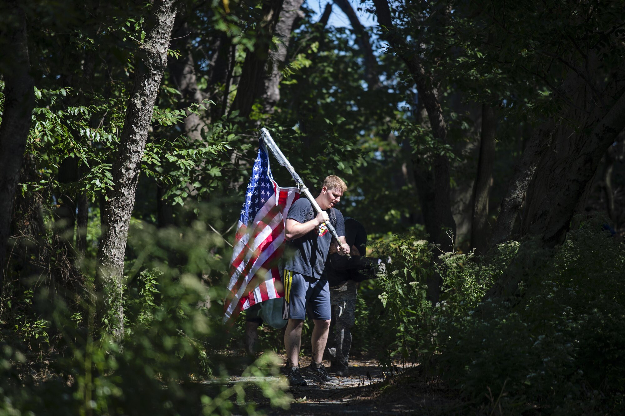 Nearly 30 Team Dover members participated in the GORUCK challenge near Dover Air Force Base, Del, on Sept. 23, 2016. Based on Special Forces training, the class was led from start to finish by a Special Forces Cadre who's job is was to test the team's limits, then push beyond them. (U.S. Air Force photo/Capt. Bernie Kale)