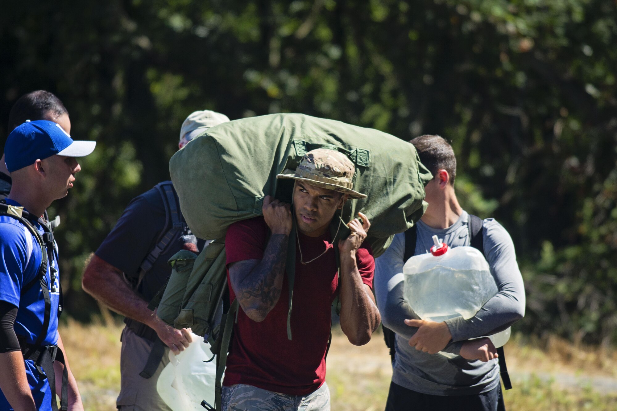 Nearly 30 Team Dover members participated in the GORUCK challenge near Dover Air Force Base, Del, on Sept. 23, 2016. Based on Special Forces training, the class was led from start to finish by a Special Forces Cadre who's job is was to test the team's limits, then push beyond them. (U.S. Air Force photo/Capt. Bernie Kale)