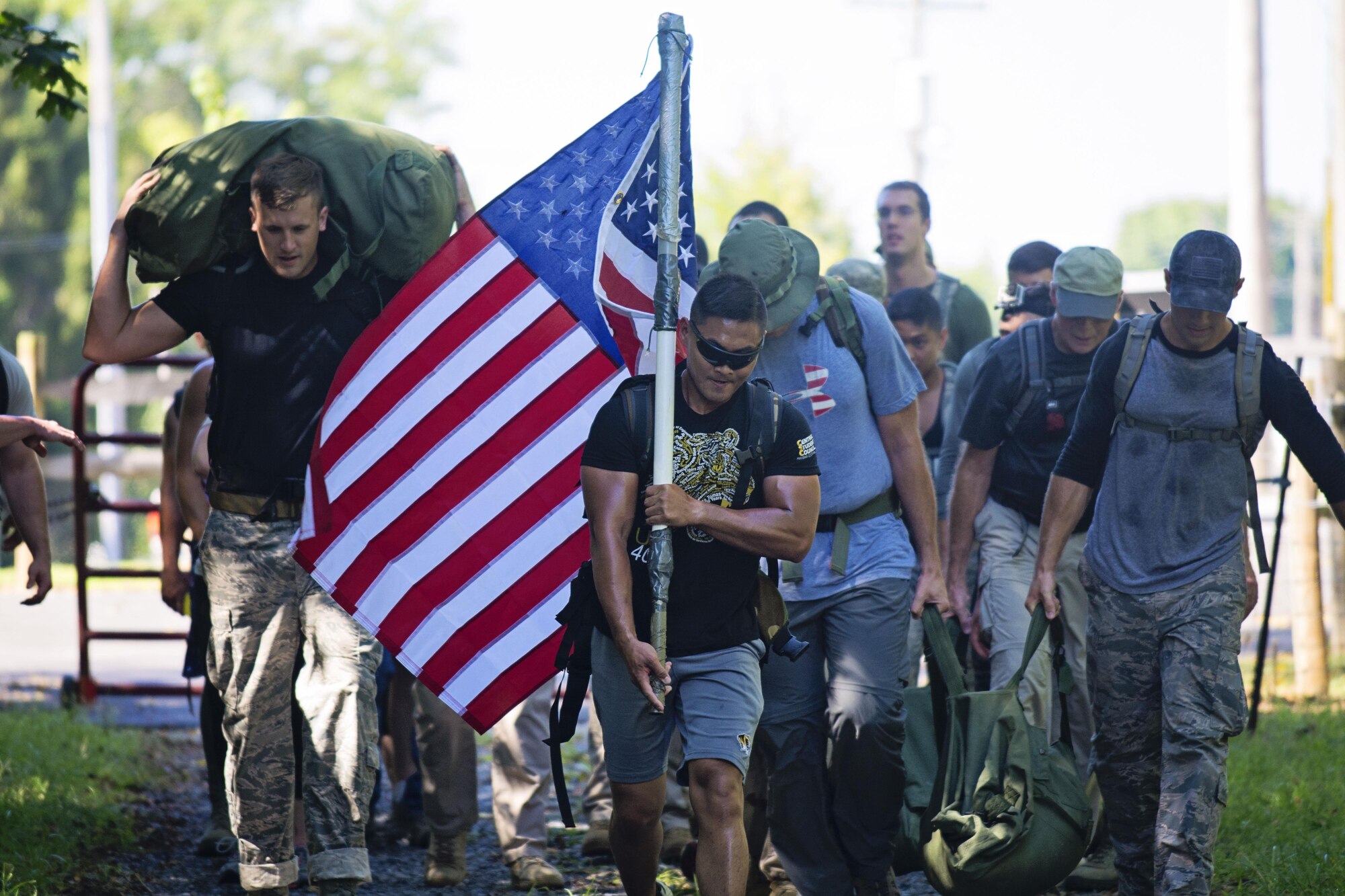 Nearly 30 Team Dover members participated in the GORUCK challenge near Dover Air Force Base, Del, on Sept. 23, 2016. Based on Special Forces training, the class was led from start to finish by a Special Forces Cadre who's job is was to test the team's limits, then push beyond them. (U.S. Air Force photo/Capt. Bernie Kale)