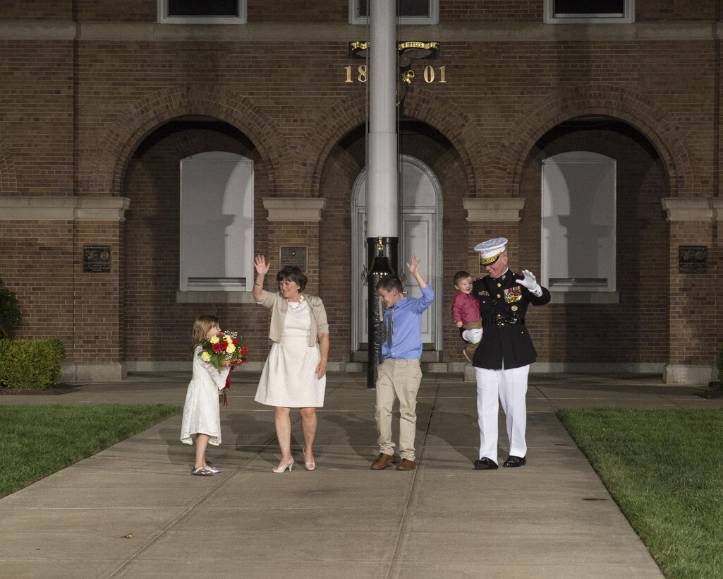Lt. Gen. John A. Toolan, his wife, Helen Toolan, and grandchildren, wave farewell to their guests at a retirement ceremony in honor of Lt. Gen. Toolan at Marine Barracks Washington, D.C., Sept. 23, 2016. Toolan devoted years 40 years to the Marine Corps. (Official Marine Corps photo by Lance Cpl. Robert Knapp/Released)