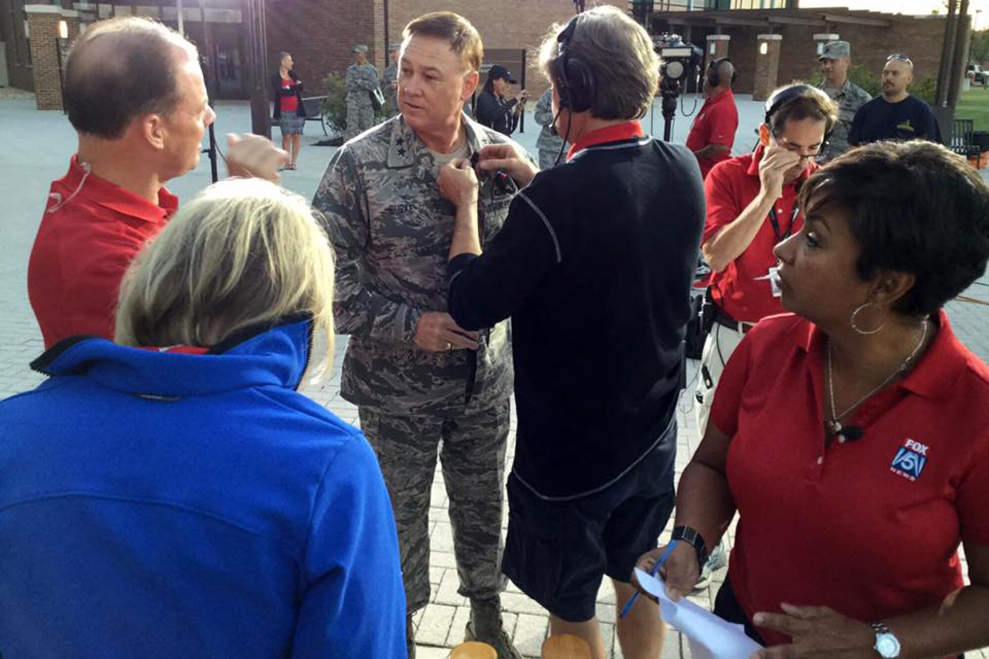 Air Force District of Washington commander Maj. Gen. Darryl Burke speaks with Fox 5 DC at the Jones building live at Joint Base Andrews on Sep. 23, 2016. AFDW hosted Fox5 DC for a live broadcast of FOX 5 News Morning and Good Day DC live from JBA in celebration of the Air Force’s 69th Birthday. (U.S. Air Force photo/Tech. Sgt. Matt Davis)