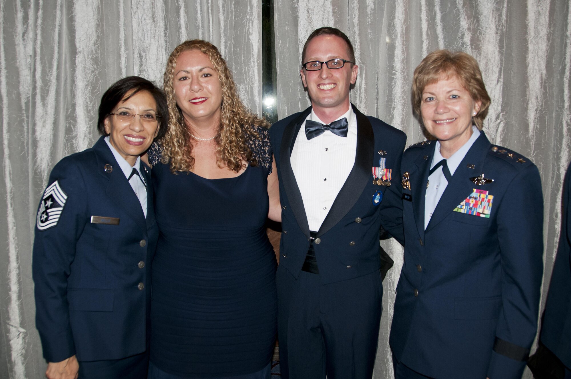 From left: Air Force Reserve Command Chief Master Sgt. Ericka Kelly, Mrs. Natalie Tolber, Staff Sgt. Aaron Tobler, Lt. Gen. Maryanne Miller, chief of the Air Force Reserve and commander, Air Force Reserve Command, during the Air Force Association recognition banquet for the 12 Outstanding Airmen of  the Year Sept. 19, 2016. Tobler is a geospatial intelligence analyst with the 50th Intelligence Squadron, Beale Air Force Base, California.