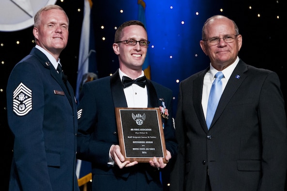 Staff Sgt. Aaron Tobler, center, with Chief Master Sgt of the Air Force James Cody and Scott Van Cleef, Air Force Association Chairman of the Board, during the AFA's recognition banquet in Washington, D.C., honoring the Air Force's 12 Outstanding Airmen of the Year, Sept. 19, 2016.  Tobler is a geospatial intelligence analyst with the 50th Intelligence Squadron, Beale Air Force Base, California. The 50th IS is a classic associate intelligence unit under the 655th Intelligence, Surveillance and Reconnaissance Group, Wright-Patterson AFB, Ohio. 