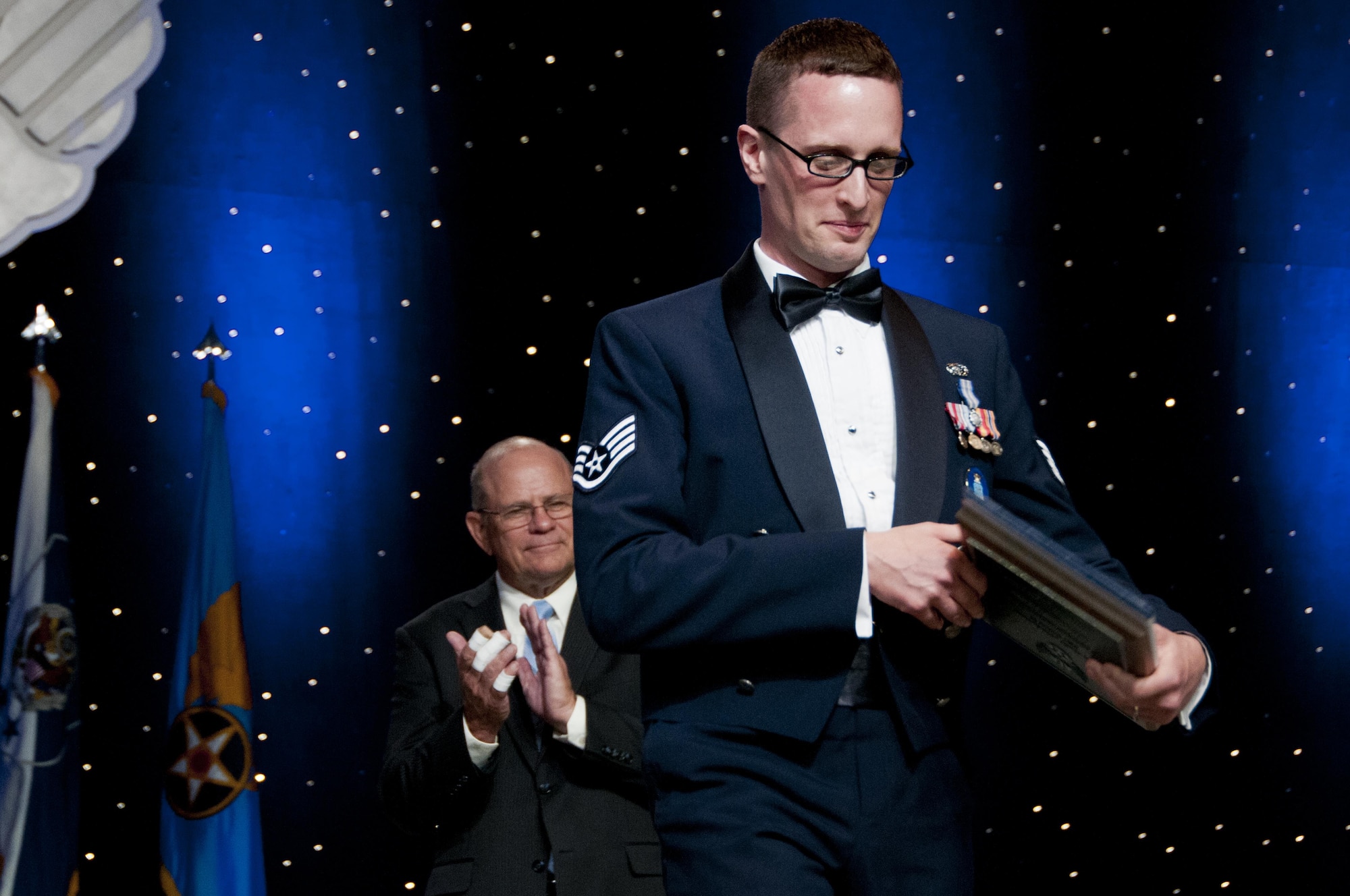 Staff Sgt. Aaron Tobler, one of the Air Force's 12 Outstanding Airmen of the Year, is recognized during the Air Force Association's Air, Space and Cyber Conference in Washington, D.C., Sept. 19, 2016.  Tobler is a geospatial intelligence analyst with the 50th Intelligence Squadron, Beale Air Force Base, California. The 50th IS is a geographically separated unit assigned to the 655th Intelligence Surveillance and Reconnaissance Group, Wright-Patterson Air Force Base, Ohio. 