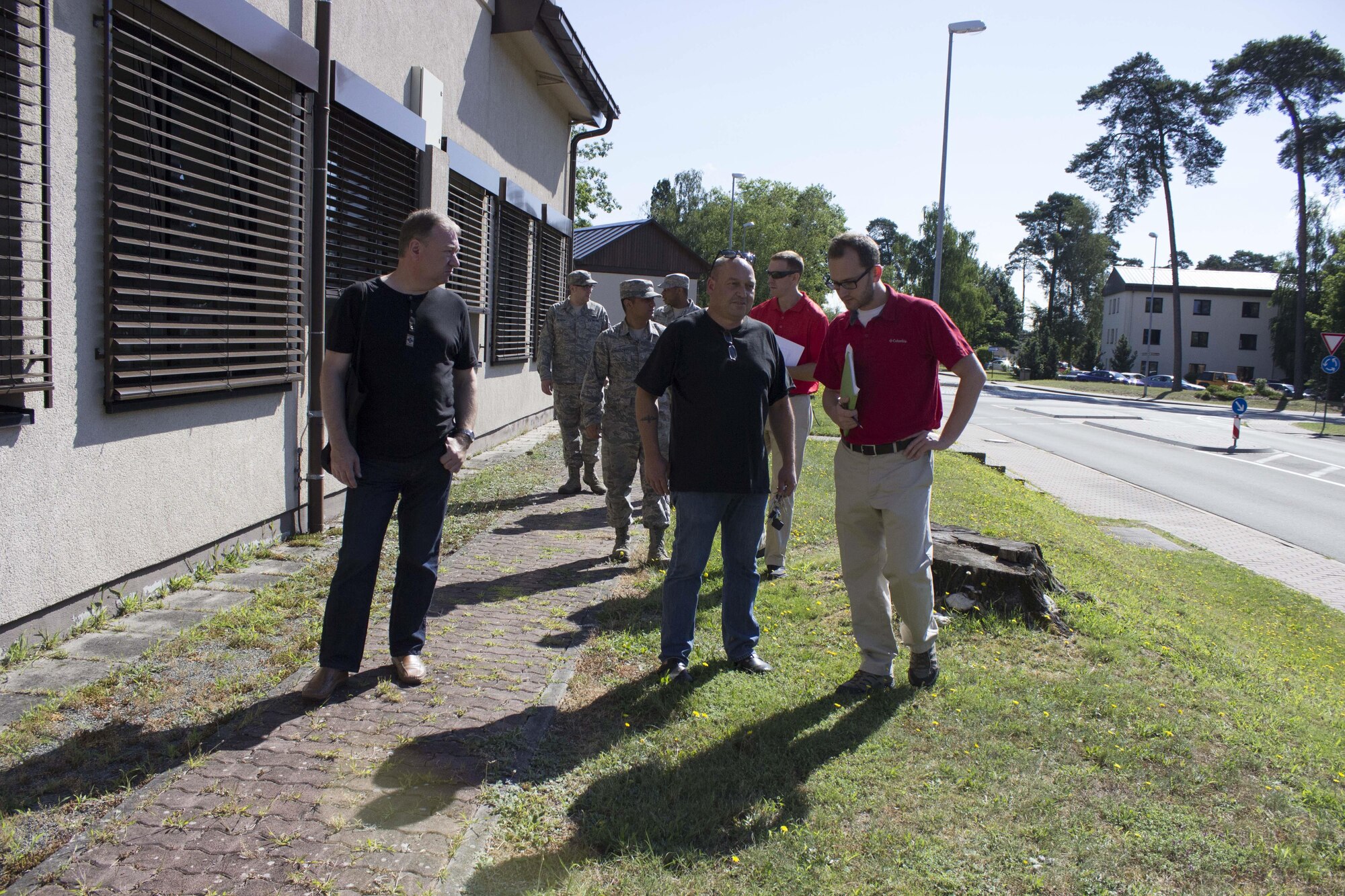 AVT members discuss train, validate and calibrate facility condition assessments with base personnel at Ramstein Air Base, Germany, recently. The team worked with base personnel using hands-on and over-the-shoulder methods of training.
(U.S. Air Force Photo/Susan Lawson)
