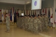 BARRIGADA, Guam – Soldiers with Detachment 5, 368th Military Police, 9th Mission Support Command, bow their heads for the benediction during their deployment ceremony on Saturday, Sept. 24, at the Guam Army National Guard Assembly Hall.