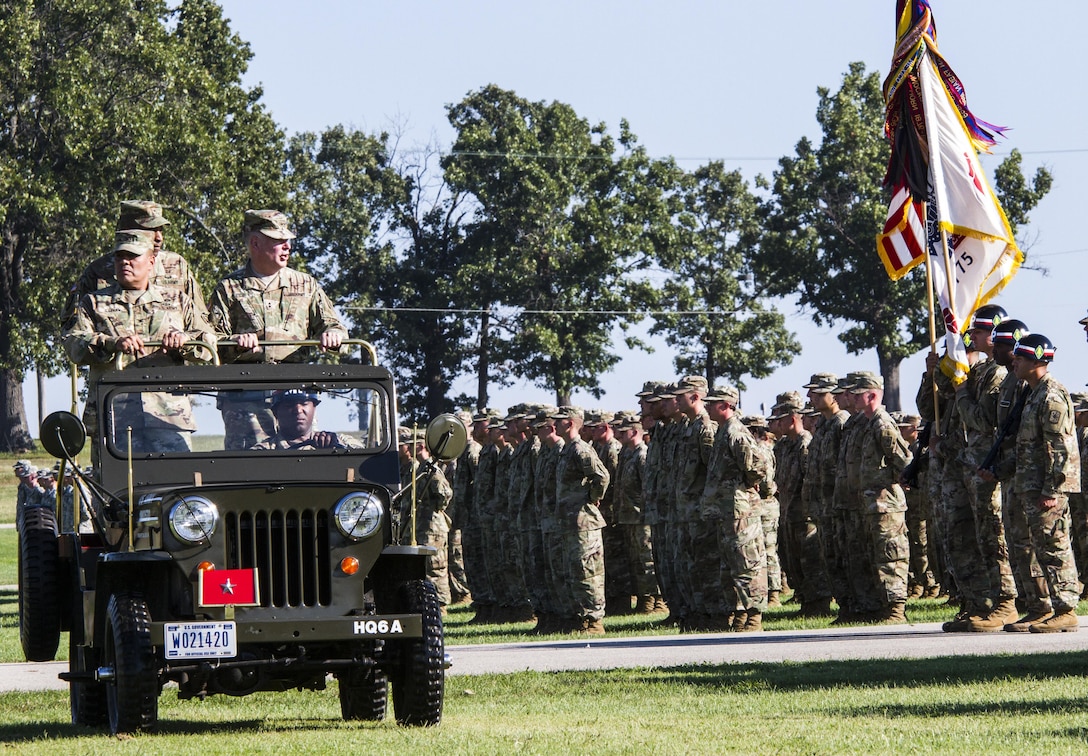 Maj. Gen. Mark Inch, provost marshal general of the Army, reviews troops in formation Sept. 22 during a Regimental Review marking the Military Police Corps Regiment's 75th anniversary at Fort Leonard Wood, Missouri. MPs attended events throughout the week to mark the anniversary. (U.S. Army photo by Sgt. 1st Class Jacob Boyer/Released)