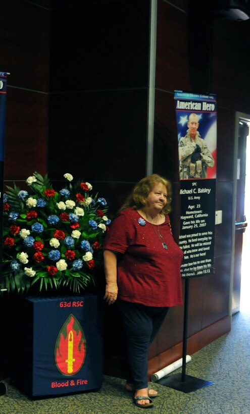 Beverly Balsley stands next to a display of her son Spc. Michael Balsley, who was killed instantly by an improvised explosive device on Jan. 25, 2007, while on patrol near Baghdad, as he served with the 2nd Infantry Division as a cavalry scout. Beverly talked about her son at a Gold Star Family Day event hosted by the 63rd Regional Support Command, Sept. 24, Armed Forces Reserve Center, Mountain View, Calif. (U.S. Army Reserve Photo by Capt. Alun Thomas)