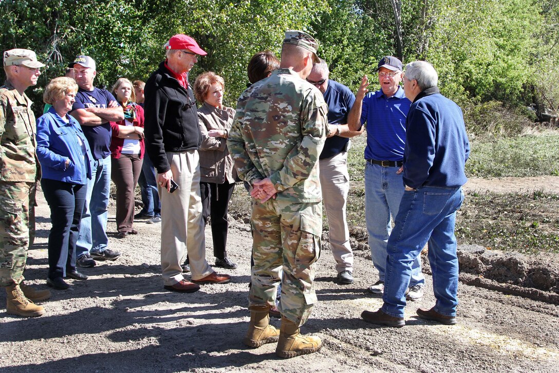James O’brien, second from right, mayor of Greene, Iowa, briefs Army Maj. Gen. Timothy E. Orr, foreground, adjutant general of Iowa; Iowa Gov. Terry Branstad; Army Brig. Gen. Stephen Warnstadt, left; and members of the emergency response team in Greene, Iowa, Sept. 26, 2016, on recent flooding. Iowa Air National Guard photo by Tech. Sgt. Linda K. Burger