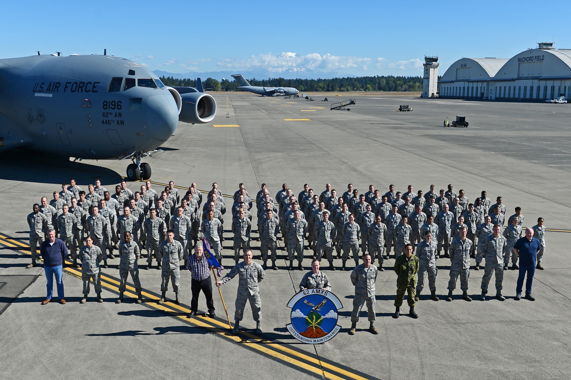 The 62nd Aircraft Maintenance Squadron poses for a group photo Sept. 12, 2016 at Joint Base Lewis- McChord, Wash. The 62nd AMXS Innovation Team was selected for the United States Transportation Command Commander's Innovation Showcase Award for the third quarter on Sept. 16, 2016. The team’s innovation has saved more than 2,000 man-hours and $4,700 and is forecasted for an estimated annual time savings of 5,400 man-hours and $24,000 cost avoidance. (U.S. Air Force photo/Senior Airman Divine Cox)