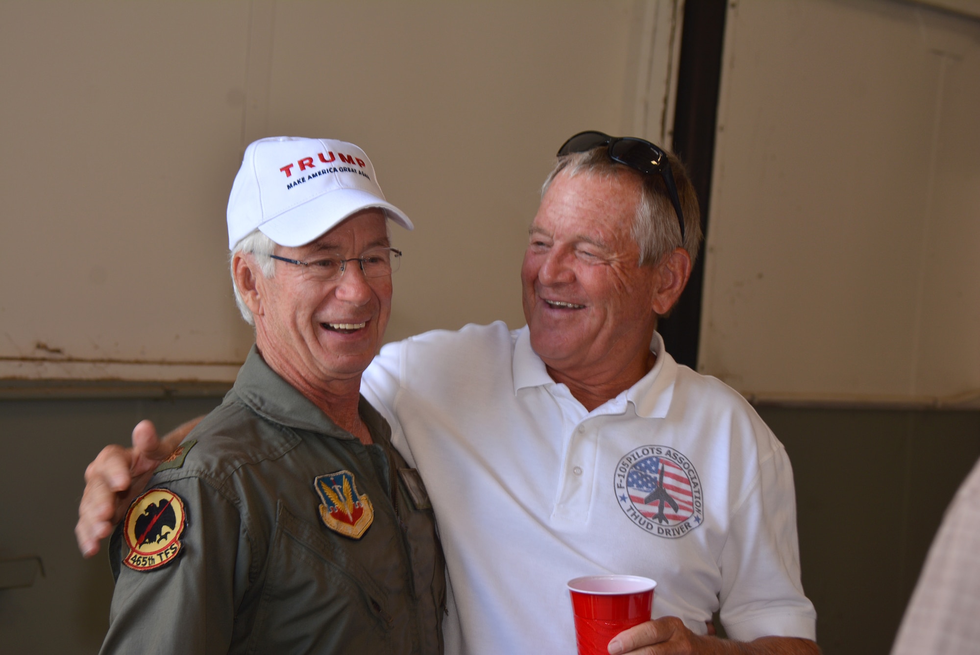 Bob Klabzuba and Tom “Waldo” King meet and share stories during the “SH Okie” reunion Sept. 23 at the 507th Air Refueling Wing Hangar 1030.  Both men served as fighter pilots in the 465th Tactical Fighter Squadron.  (U.S. Air Force Photo/Maj. Jon Quinlan) 