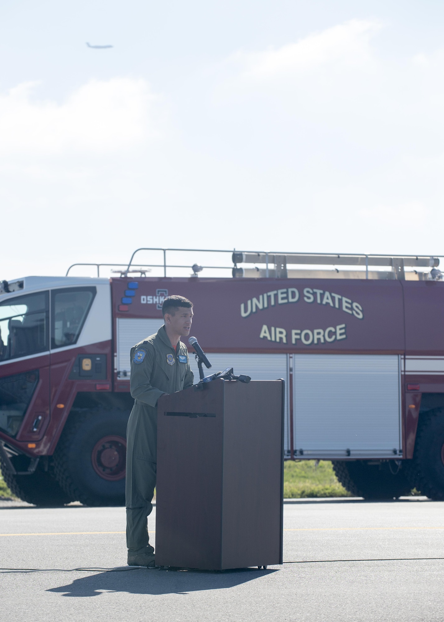 Capt. Jose Hinojosa, 9th Airlift Squadron pilot, speaks during a ribbon cutting ceremony for Runway 01-19 Sept. 23, 2016, on Dover Air Force Base, Del. Hinojosa narrated the ceremony, which marked the opening of runway 01-19, returning C-5M Super Galaxy operations from Joint Base McGuire-Dix-Lakehurst, N.J. (U.S. Air Force photo by Staff Sgt. Jared Duhon) 