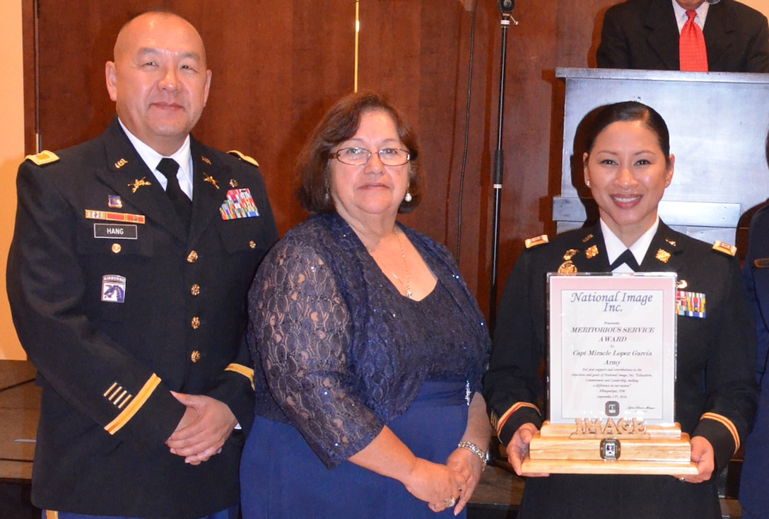 Army Capt. Miracle Garcia has been honored with the 2016 National Image Inc. Award for Meritorious Military Service. Garcia (right) was joined by her supervisor from DLA Land and Maritime Col. Yee Hang (left) at the Sept. 15. ceremony in Albuquerque, N.M., hosted by National Image Inc. president and CEO Sylvia Chavez-Metoyer (middle).