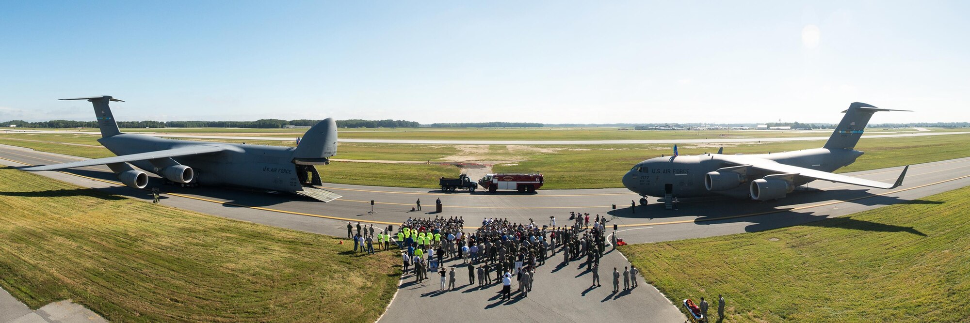 Team Dover gathers during a ribbon cutting ceremony that reopened Runway 01-19, Sept. 23, 2016, at Dover Air Force Base, Del. More than 200 Team Dover members attended the event. Those in attendance included several U.S. senators, local government members and members of the 436th Airlift Wing, 512th AW, 166th AW and Joint Base McGuire-Dix-Lakehurst, N.J. (U.S. Air Force photo by Mauricio Campino)