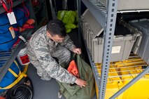 Senior Airman Nicholas Arvelo, a bioenvironmental engineering technician with the 5th Medical Group, stores away chemical gear at Minot Air Force Base, N.D., Sept. 22, 2016. The three main sections of what bioenvironmental engineering technicians focus on are occupational, environmental and emergency response. (U.S. Air Force photo/Airman 1st Class Jonathan McElderry)