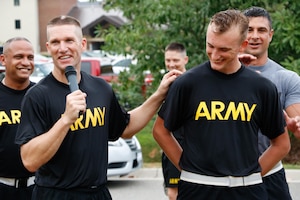 Sgt. Maj. of the U.S. Army Daniel A. Dailey speaks with 7th Transportation Brigade (Expeditionary) Soldiers before running with them at Joint Base Langley-Eustis, Va., Sept. 19, 2016. Dailey also recognized Soldiers selected by their first sergeants as superb performers. (U.S. Army photo by Spc. Wilmarys Roman Rivera)