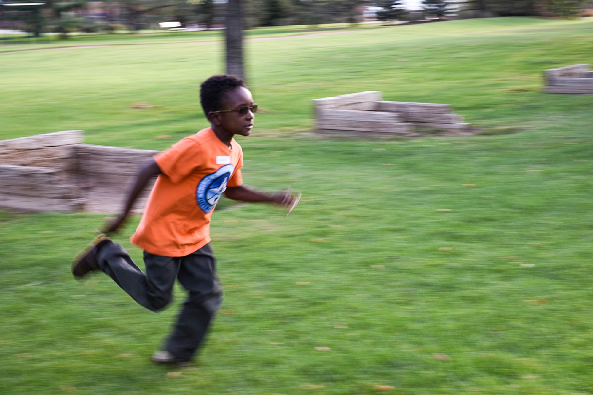 PETERSON AIR FORCE BASE, Colo. – Houston Jeanjacques participates in a relay event during the Family Fun Night at Lyon’s Park on Peterson Air Force Base, Colo., Sept. 22, 2016. The event was put on by the Health and Wellness Center and designed to provide families with a fun opportunity to be active and learn about healthy lifestyle habits. (U.S. Air Force photo by Senior Airman Rose Gudex)