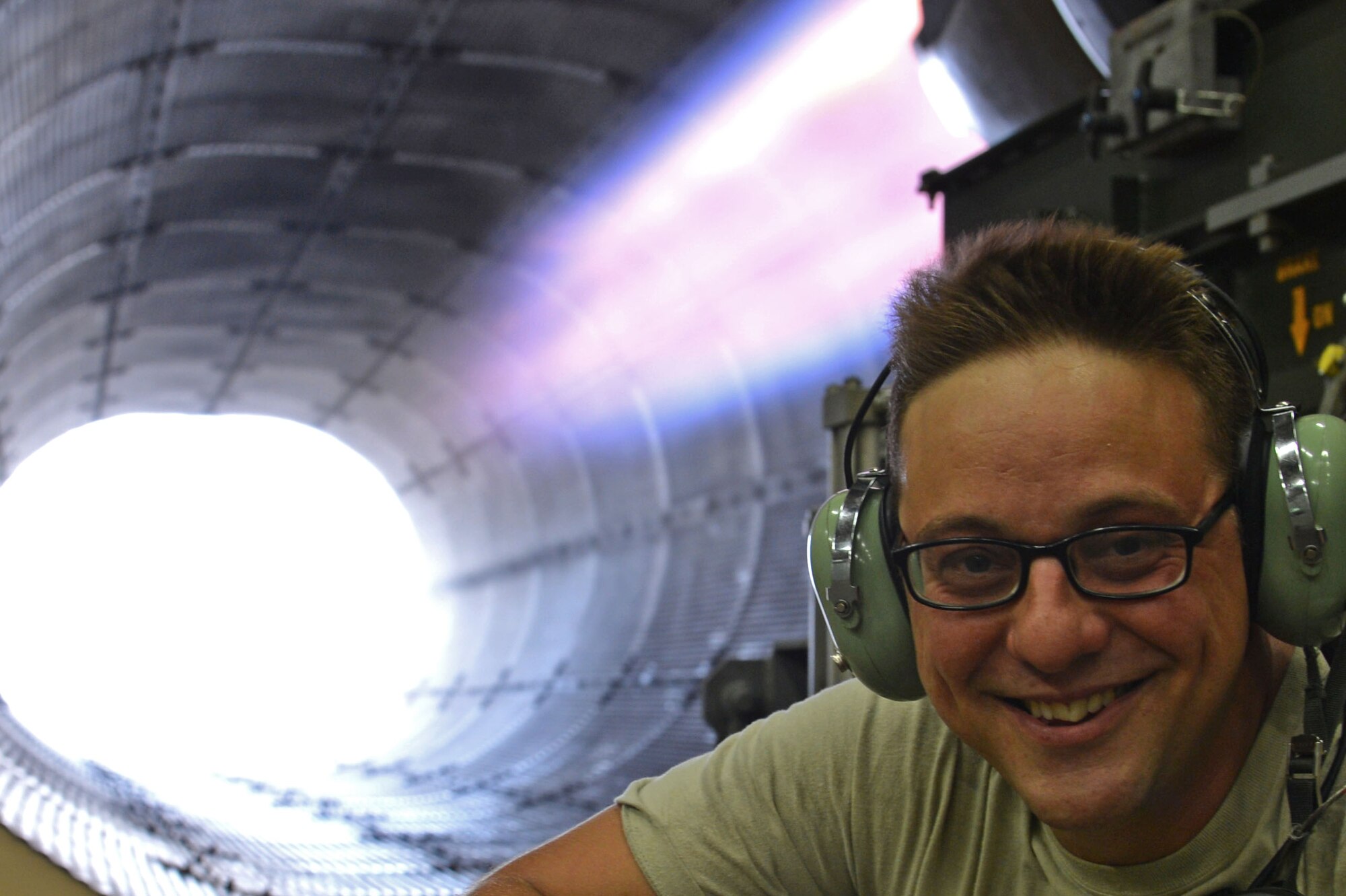 U.S. Air Force Staff Sgt. Dale Rodgers, 20th Component Maintenance Squadron aerospace propulsion craftsman, smiles during and engine check of an F-16CM Fighting Falcon at the 20th CMS engine test facility at Shaw Air Force Base, S.C., Sept. 26, 2016. Rodgers, with the assistance of other 20th CMS Airmen, check an F-16 engine while it activates 32,000 pounds of thrust. (U.S. Air Force photo by Airman 1st Class Christopher Maldonado)