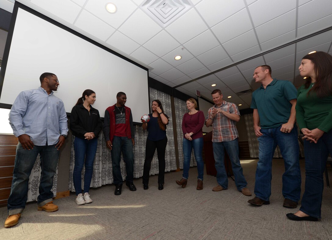 Couples from Ellsworth Air Force Base engage in icebreaker games during a “Mil-to-Mil” Workshop at the Rushmore Hotel in Rapid City, S.D., Sept. 23, 2016. The games helped ease participants and encouraged them to get to know one another. (U.S. Air Force photo by Airman 1st Class Donald C. Knechtel)