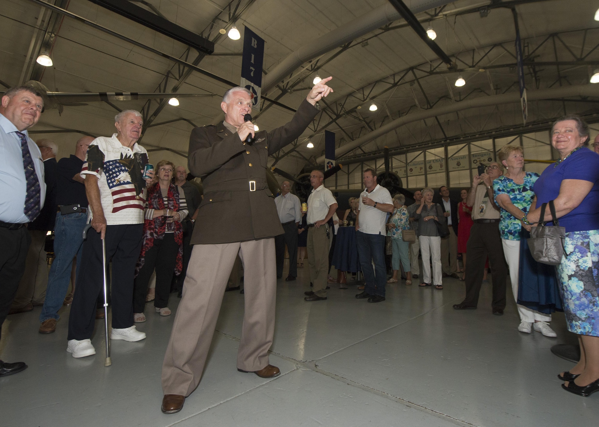 Retired Lt. Gen. William Welser III, former 436th Airlift Wing commander and current friend of the museum, dressed in a World War II-era U.S. Army Air Forces uniform speaks at the Festival of Flight Exclusive Party and Raffle Sept. 23, 2016, at the Air Mobility Command Museum on Dover Air Force Base, Del. Welser, who was wing commander from 1992 to 1994, was instrumental in reutilizing Hangar 1301 as the AMC Museum’s home. (U.S. Air Force photo by Senior Airman Zachary Cacicia)