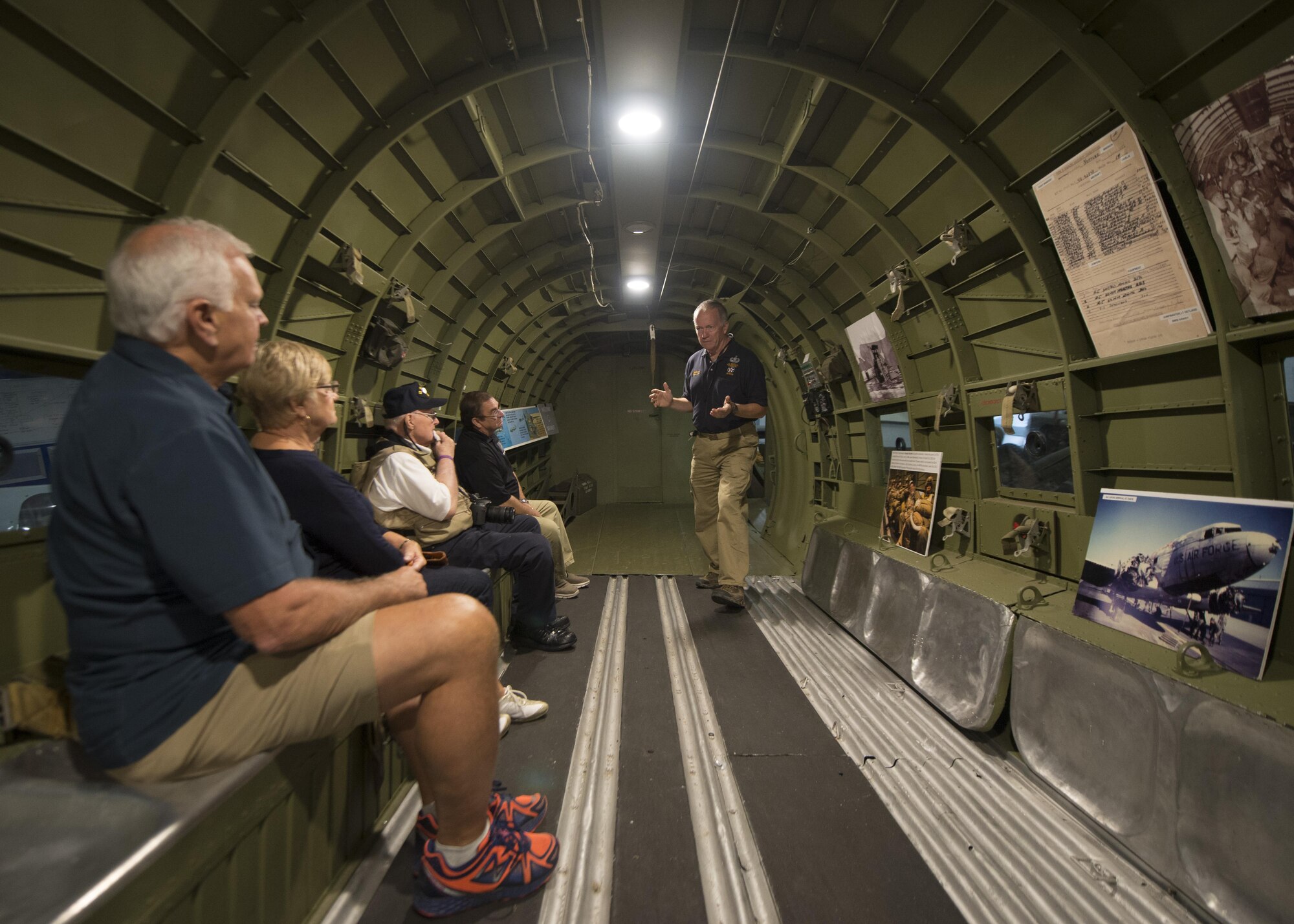 Retired U.S. Army Col. Bob Leicht, Air Mobility Command Museum volunteer, gives visitors a tour of the C-47A Skytrain, “Turf and Sport Special,” during the AMC Museum’s Festival of Flight 30th Anniversary celebration Sept. 24, 2016, at the AMC Museum on Dover Air Force Base, Del. This aircraft, which has been undergoing an extensive restoration, saw action on D-Day, the invasion of Normandy, dropping paratroopers from the 82nd Airborne Division into St. Mere-Eglise, France. (U.S. Air Force photo by Senior Airman Zachary Cacicia)