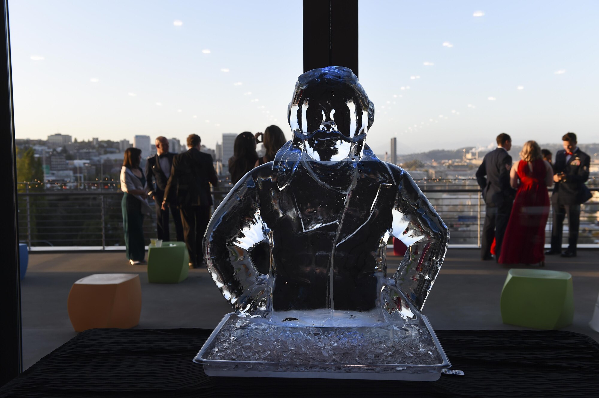 An ice sculpture of a pilot sits on the table inside the Lemay America’s Car Museum in Tacoma, Wash., Sept. 23, 2016. Team McChord celebrated the United States Air Force’s 69th birthday by continuing in the service’s traditions including toasts, the symbolic cutting of the cake and singing the Air Force Song. (U.S. Air Force photo/Staff Sgt. Naomi Shipley)